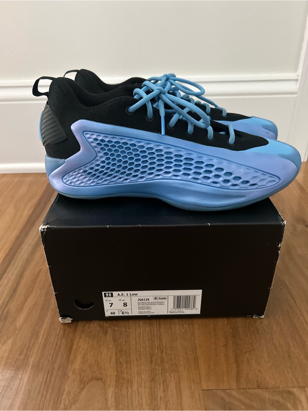 adidas Black and Light Blue Low-Top Athletic Shoes